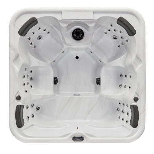 Luxury Spas Eclipse 6-person hot tub with sleek design, built-in jets, and LED lighting in a soft gray finish