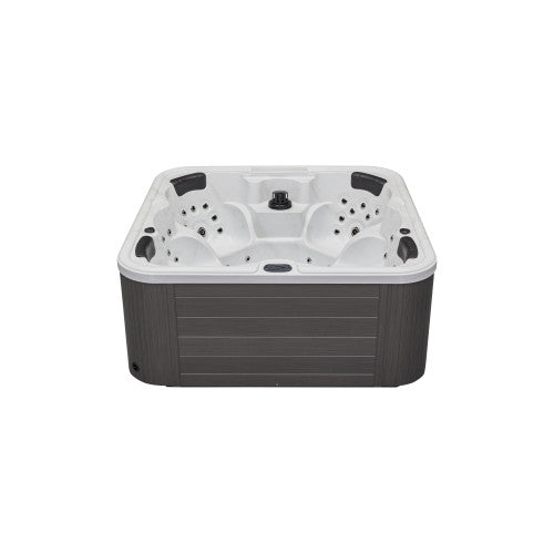 Luxury Spas Eclipse 6 Person hot tub with modern design, built-in jets, and soft seating, perfect for relaxation.