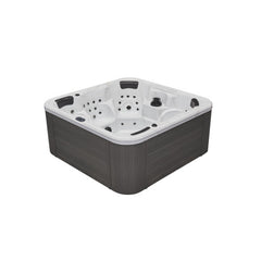 Luxury Spas Eclipse 6-person hot tub with a sleek gray exterior and spacious seating for ultimate relaxation