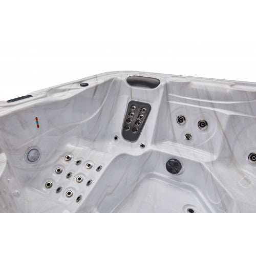 Luxury Spas 5-person hot tub with jets, built-in LED lights, and durable acrylic finish in a modern gray design