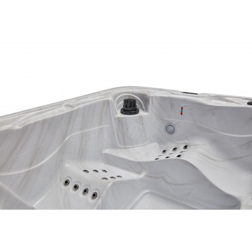 Luxury Spas Estes 5-person hot tub with a sleek design and spacious seating in a modern outdoor setting