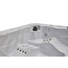 Luxury Spas Estes 5-person hot tub with a sleek design and spacious seating in a modern outdoor setting