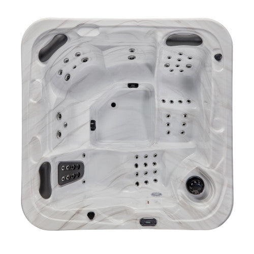 Luxury Spas 5-person hot tub with bubble jets and LED lighting, in a sleek modern design.