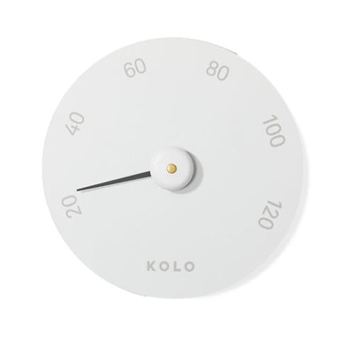 White KOLO thermometer with minimalistic dial and gold accent, indicating temperature ranges.