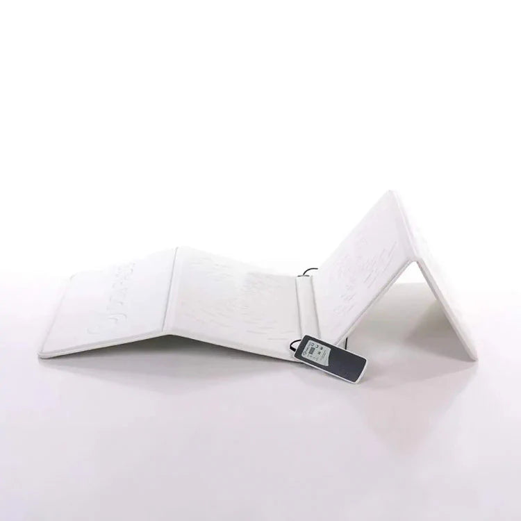 OMI PEMF mat in blue, featuring a textured surface for therapeutic use by Oxford Medical Instruments