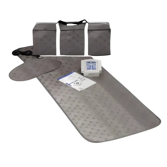 QRS 101 PEMF home system with gray therapy mat, controller, and user manual for effective PEMF therapy.