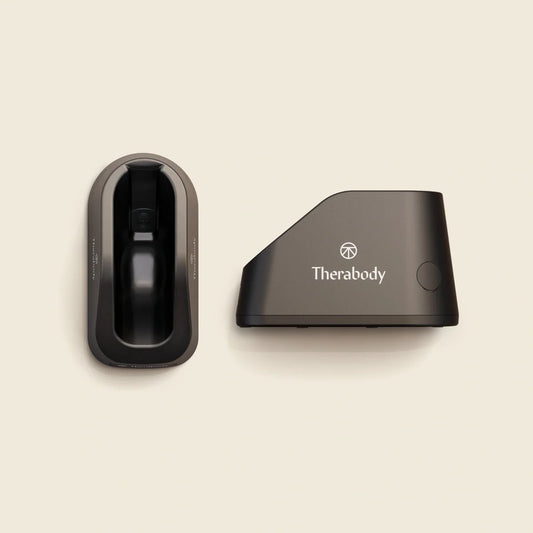Two black electronic devices on a beige background with 'Therabody' branding.