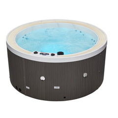 Luxury Spas Oscar 6 person hot tub with a sleek design, spa jets, and a warm gray exterior.