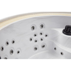 Luxury Spas Oscar 6-person hot tub with sleek design, built-in jets, and ambient lighting, perfect for relaxation