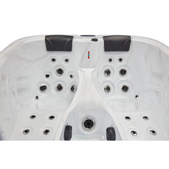 Luxury Spas Largo three-person hot tub with elegant design and soothing jets in a modern outdoor setting