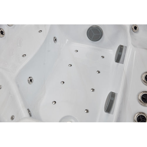 Luxury Spas Danika hot tub seating five, featuring a modern design and soothing water jets in a sleek gray finish