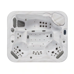 Luxury Spas Danika 5-person hot tub with a sleek design, adjustable jets, and modern gray exterior.