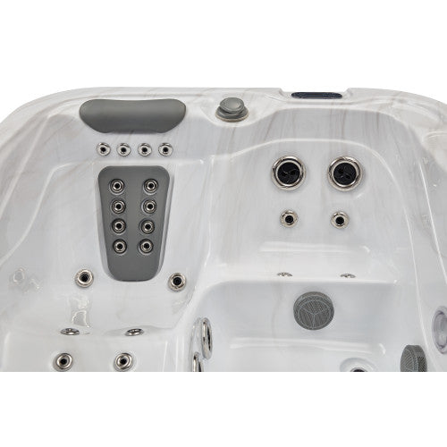 Luxury Spas Casey 3 Person Hot Tub in a modern design with built-in jets and light gray exterior