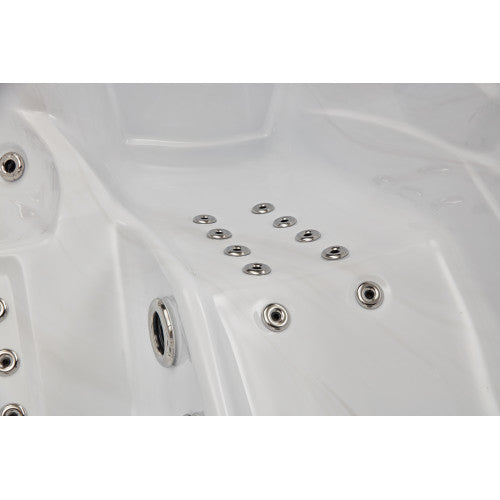Luxury Spas Casey 3 person hot tub with a sleek design, deep seating, and relaxing water jets in a modern style.