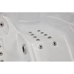 Luxury Spas Casey 3 person hot tub with a sleek design, deep seating, and relaxing water jets in a modern style.