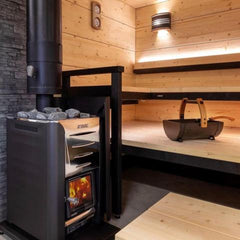 Harvia Pro 26 wood burning sauna heater with black metal finish, designed for commercial use, 26kW capacity.