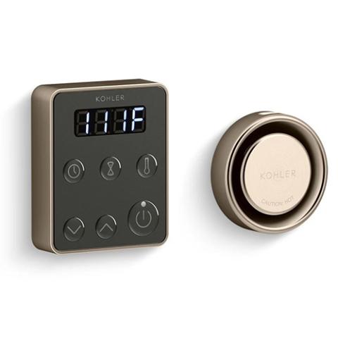Kohler K-5557 digital thermostat control with round dial, available in matte black and brushed nickel finishes.