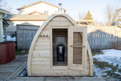 Dundalk cedar barrel sauna for 4 people, 7x7 size, featuring Canadian timber construction and a natural wood finish.