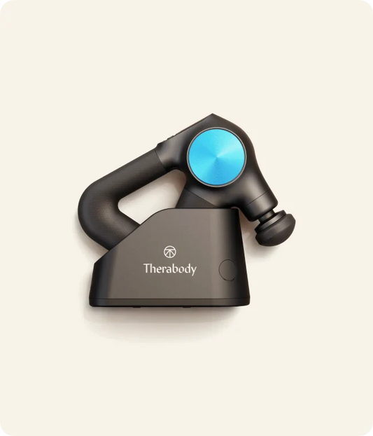 Theragun PRO Plus Charging Stand on a beige background